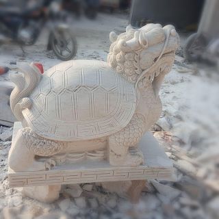 晚霞紅風(fēng)水龍龜石雕是怎么制作出來(lái)的？