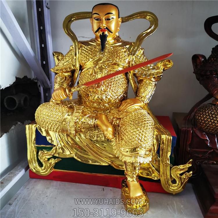 金色鎏金真武大帝銅像，單手持劍一腳盤(pán)坐一腳著地的真武祖師塑像雕塑
